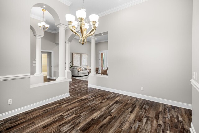 203 Landings Dr, Lynn Haven, FL 32444 - unfurnished dining area featuring dark wood-style floors, ornamental molding, baseboards, and a chandelier