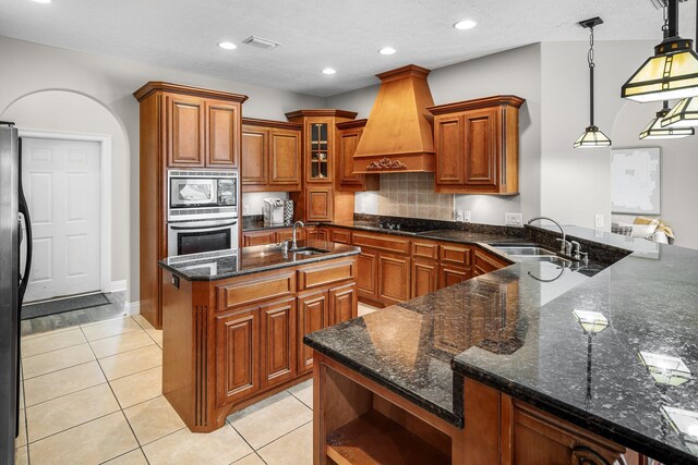 203 Landings Dr, Lynn Haven, FL 32444 - kitchen featuring a sink, appliances with stainless steel finishes, open shelves, brown cabinets, and recessed lighting