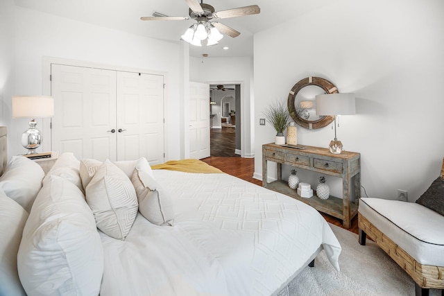 203 Landings Dr, Lynn Haven, FL 32444 - bedroom with a closet, a ceiling fan, baseboards, and wood finished floors