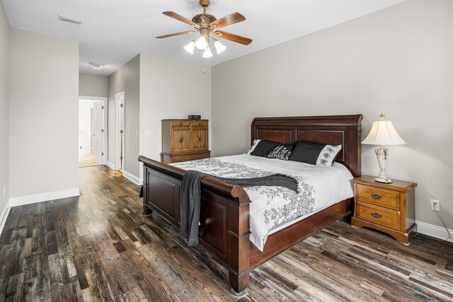 203 Landings Dr, Lynn Haven, FL 32444 - bedroom with wood finished floors, baseboards, and a ceiling fan