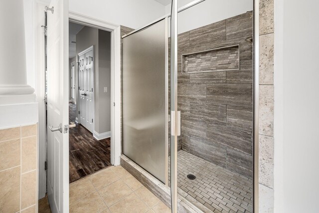 203 Landings Dr, Lynn Haven, FL 32444 - bathroom featuring a stall shower and tile patterned flooring