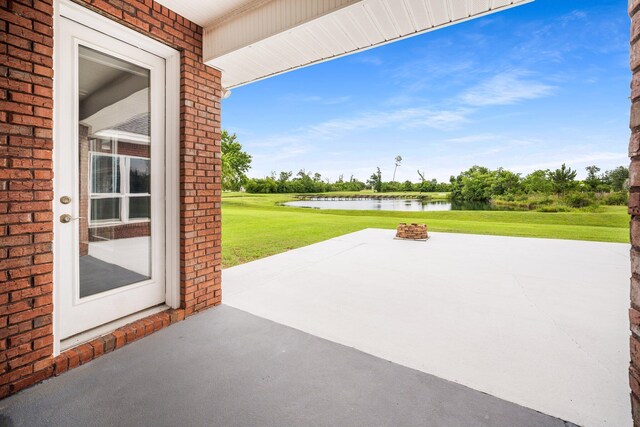 203 Landings Dr, Lynn Haven, FL 32444 - view of patio / terrace featuring a water view