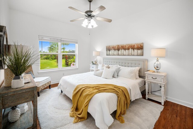 203 Landings Dr, Lynn Haven, FL 32444 - bedroom with wood finished floors, baseboards, and ceiling fan
