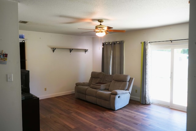 74 8th St, Shalimar, FL 32579 - living room with ceiling fan, wood finished floors, and a textured ceiling