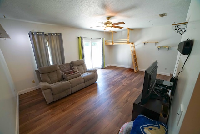 74 8th St, Shalimar, FL 32579 - living area featuring ceiling fan, wood finished floors, and a textured ceiling