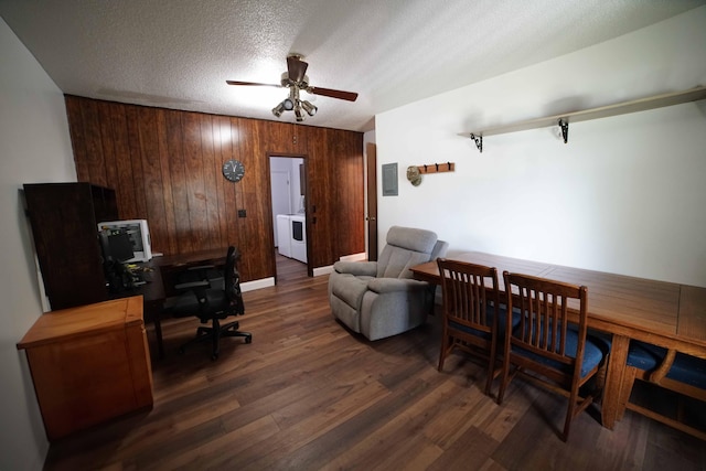 74 8th St, Shalimar, FL 32579 - office space featuring independent washer and dryer, ceiling fan, dark wood finished floors, wooden walls, and a textured ceiling