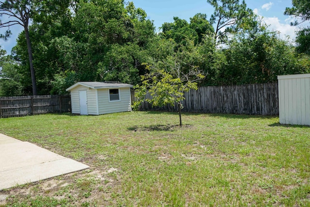 74 8th St, Shalimar, FL 32579 - fenced backyard featuring a storage unit