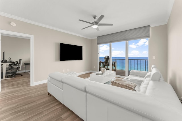 17281 Front Beach Rd Unit 1206, Panama City Beach, FL 32413 - living room with ceiling fan, light wood-style floors, ornamental molding, and an office area