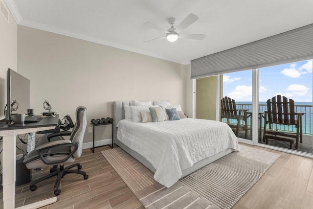 17281 Front Beach Rd Unit 1206, Panama City Beach, FL 32413 - bedroom with access to outside, ornamental molding, light wood-style floors, an office area, and ceiling fan