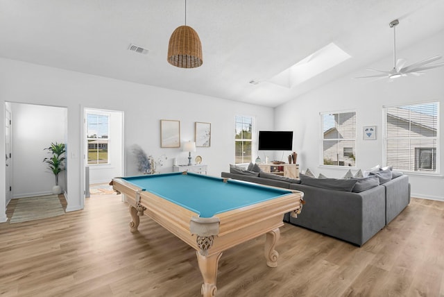 413 Colorado Dr, Mexico Beach, FL 32456 - recreation room featuring vaulted ceiling, pool table, a skylight, ceiling fan, and light wood-style flooring