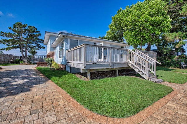 411-A Cobia Ave, Fort Walton Beach, FL 32548 - rear view of property with a wooden deck
