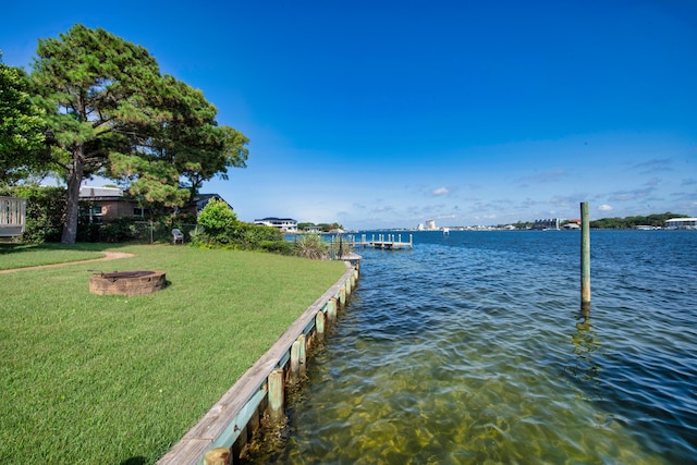 411-A Cobia Ave, Fort Walton Beach, FL 32548 - dock with a water view, a yard, and an outdoor fire pit