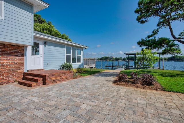 411-A Cobia Ave, Fort Walton Beach, FL 32548 - view of patio featuring a water view and a dock