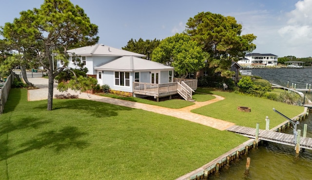 411-A Cobia Ave, Fort Walton Beach, FL 32548 - rear view of house with a deck with water view and a metal roof