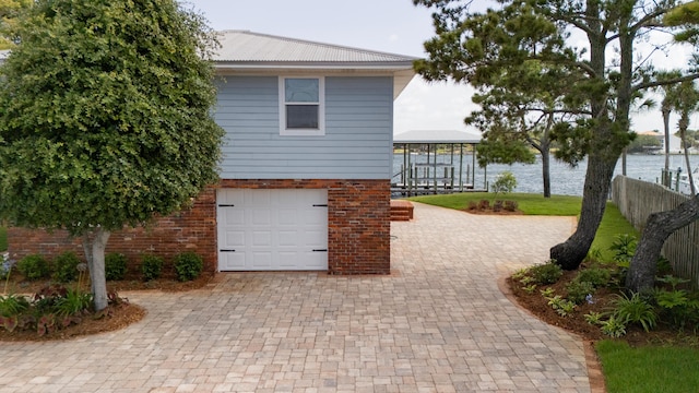 411-A Cobia Ave, Fort Walton Beach, FL 32548 - garage with a water view and decorative driveway