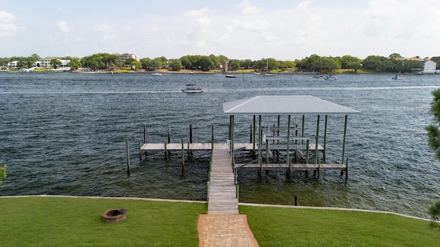 411-A Cobia Ave, Fort Walton Beach, FL 32548 - dock featuring a water view, boat lift, and a yard