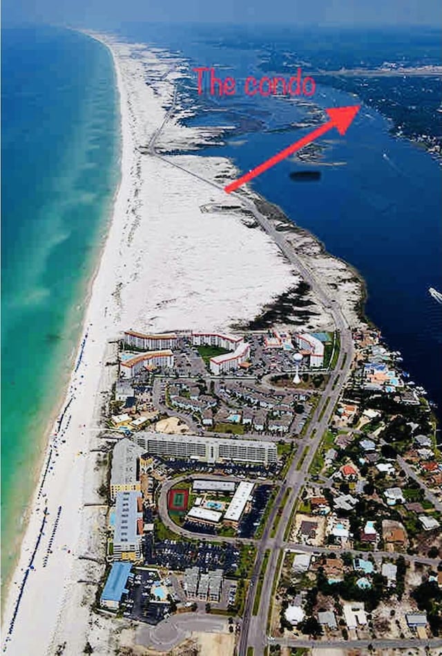 209 W Miracle Strip Pkwy Unit H 103, Mary Esther, FL 32569 - bird's eye view of waterfront with a beach