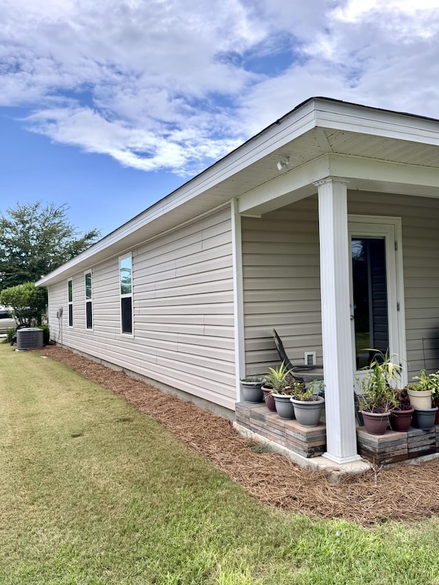 629 Earl Godwin Rd, Freeport, FL 32439 - view of home's exterior featuring a yard and a central AC unit