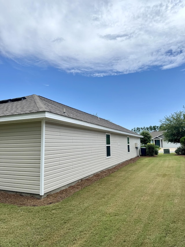 629 Earl Godwin Rd, Freeport, FL 32439 - view of side of property with a lawn