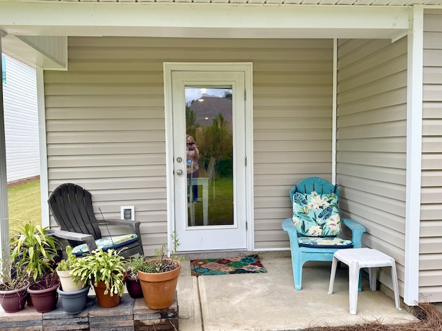 629 Earl Godwin Rd, Freeport, FL 32439 - view of exterior entry with a patio area