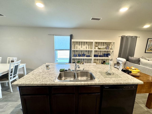 629 Earl Godwin Rd, Freeport, FL 32439 - kitchen with dishwasher, open floor plan, a kitchen island with sink, recessed lighting, and dark brown cabinets