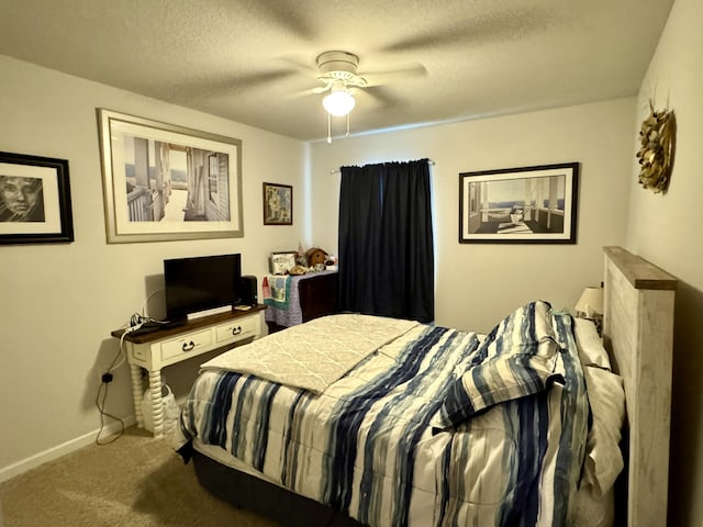 629 Earl Godwin Rd, Freeport, FL 32439 - carpeted bedroom with a textured ceiling and ceiling fan