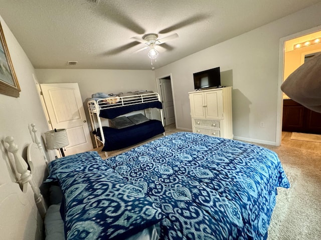 629 Earl Godwin Rd, Freeport, FL 32439 - carpeted bedroom featuring a textured ceiling and ceiling fan