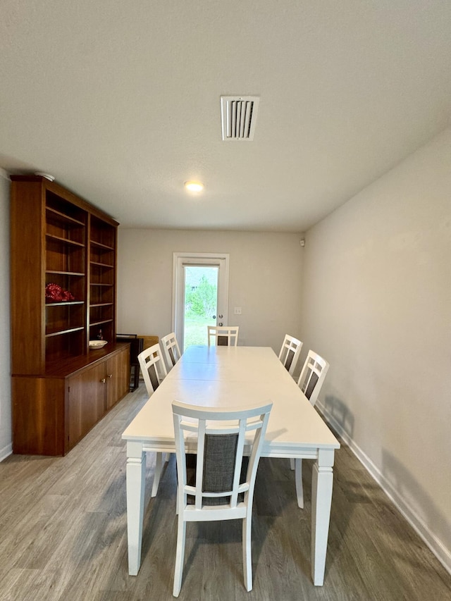 629 Earl Godwin Rd, Freeport, FL 32439 - dining area with wood finished floors