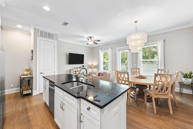 2350 W County Highway 30a Unit 2, Santa Rosa Beach, FL 32459 - kitchen with a sink, wood finished floors, stainless steel dishwasher, ornamental molding, and a kitchen island with sink