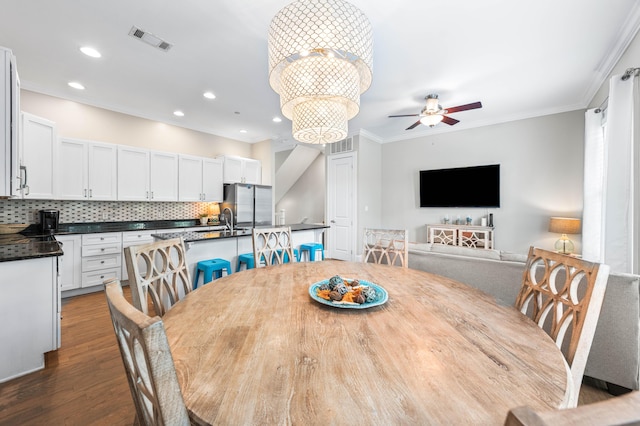 2350 W County Highway 30a Unit 2, Santa Rosa Beach, FL 32459 - dining room featuring ceiling fan, dark wood-type flooring, ornamental molding, and recessed lighting