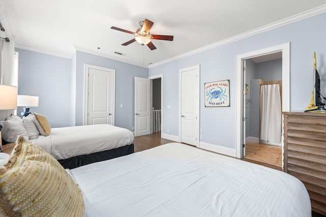 2350 W County Highway 30a Unit 2, Santa Rosa Beach, FL 32459 - bedroom featuring wood finished floors, ornamental molding, baseboards, and ceiling fan