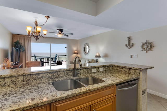 866 Santa Rosa Blvd Unit 302, Fort Walton Beach, FL 32548 - kitchen featuring stainless steel dishwasher, light tile patterned floors, light stone countertops, ceiling fan, and hanging light fixtures