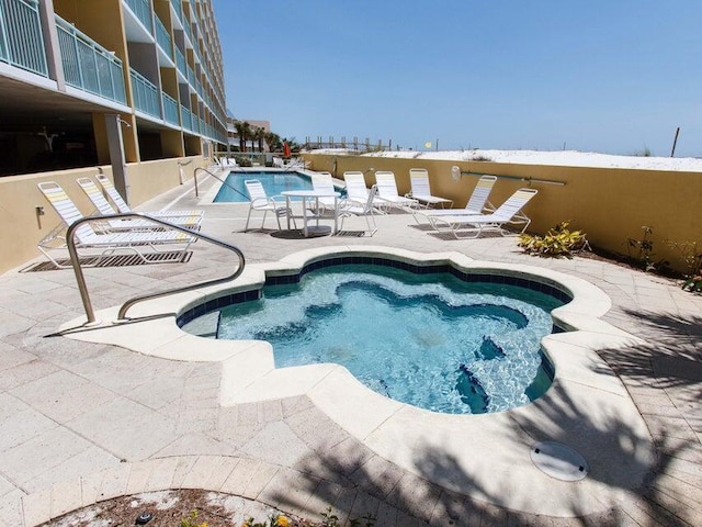 866 Santa Rosa Blvd Unit 302, Fort Walton Beach, FL 32548 - community pool with a patio