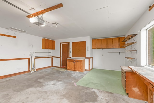 19 Bayview Dr, Shalimar, FL 32579 - garage with a garage door opener and a workshop area