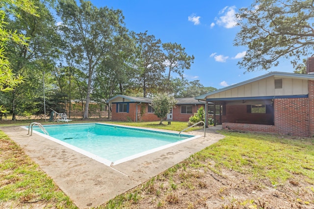19 Bayview Dr, Shalimar, FL 32579 - outdoor pool featuring a yard and ceiling fan