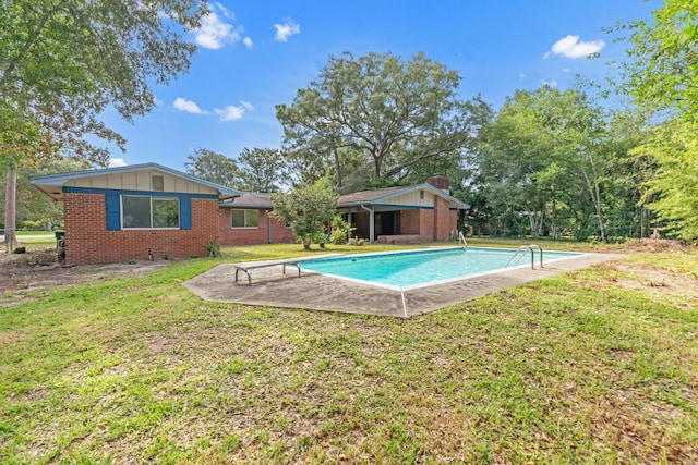 19 Bayview Dr, Shalimar, FL 32579 - outdoor pool featuring a yard and a patio
