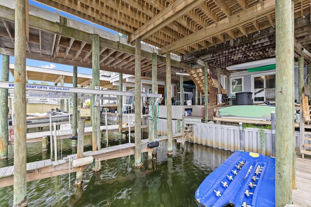 113 Durango Rd, Destin, FL 32541 - dock area with boat lift and a water view