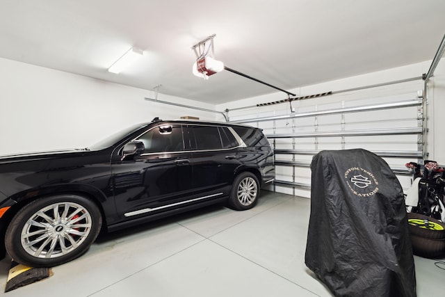 304 Windrow Way, Inlet Beach, FL 32461 - garage featuring a garage door opener