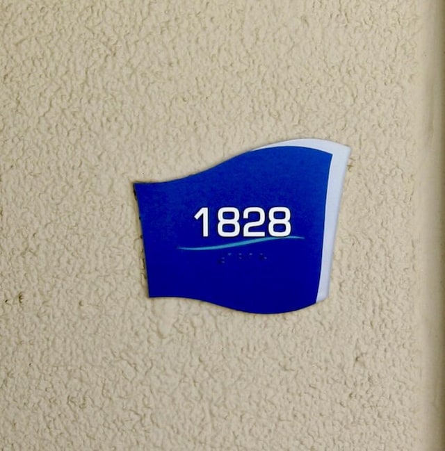9902 S Thomas Dr Unit 1828, Panama City Beach, FL 32408 - exterior view of stucco siding