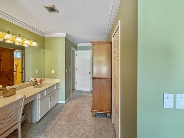458 Linkside Pl, Miramar Beach, FL 32550 - bathroom with crown molding, vanity, carpet, baseboards, and a textured ceiling