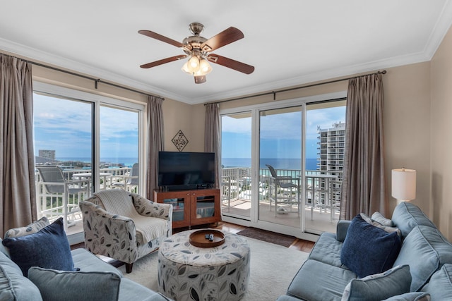 112 Seascape Dr Unit 1201, Miramar Beach, FL 32550 - living room with wood finished floors, healthy amount of natural light, crown molding, and ceiling fan