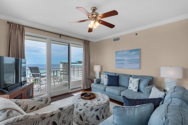 112 Seascape Dr Unit 1201, Miramar Beach, FL 32550 - living area featuring crown molding, ceiling fan, and wood finished floors
