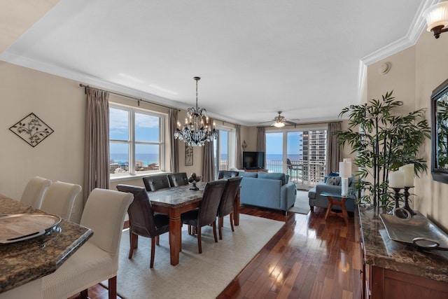 112 Seascape Dr Unit 1201, Miramar Beach, FL 32550 - dining space featuring a chandelier, healthy amount of natural light, hardwood / wood-style floors, crown molding, and ceiling fan