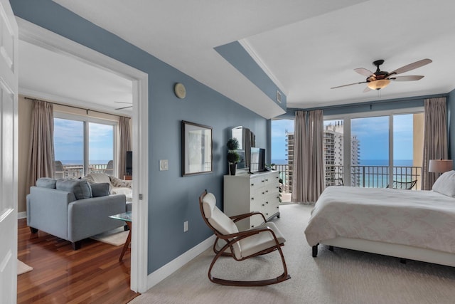 112 Seascape Dr Unit 1201, Miramar Beach, FL 32550 - bedroom with access to outside, baseboards, and wood finished floors