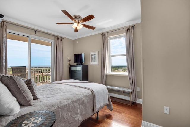 112 Seascape Dr Unit 1201, Miramar Beach, FL 32550 - bedroom featuring wood finished floors, baseboards, access to exterior, ornamental molding, and ceiling fan