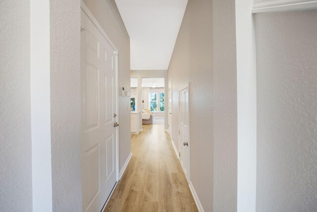 233 Sand Oak Blvd, Panama City Beach, FL 32413 - hall featuring light wood finished floors