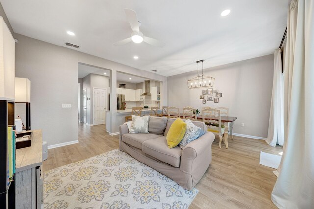 233 Sand Oak Blvd, Panama City Beach, FL 32413 - living area with ceiling fan, baseboards, light wood finished floors, and recessed lighting