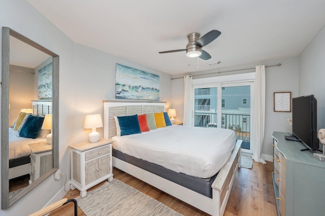 11 Beachside Dr Unit 522, Santa Rosa Beach, FL 32459 - bedroom with access to exterior, wood finished floors, and a ceiling fan