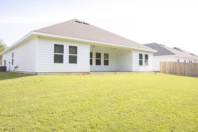 56 Secluded Cir, Freeport, FL 32439 - rear view of house with a ceiling fan and roof with shingles