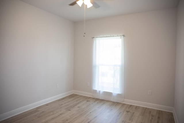 56 Secluded Cir, Freeport, FL 32439 - spare room with light wood-type flooring and ceiling fan